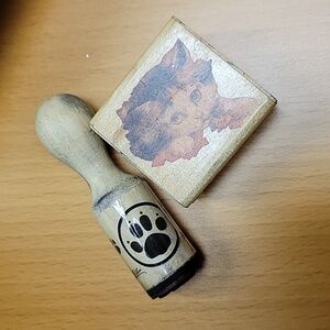 Stamper cat and paw
